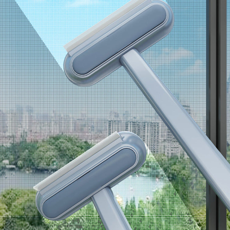 Window cleaning tool with a long handle cleaning a window.