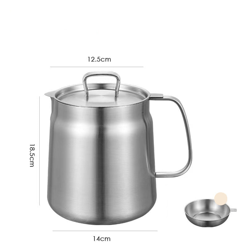Stainless steel oil strainer pot with lid and filter on a white background