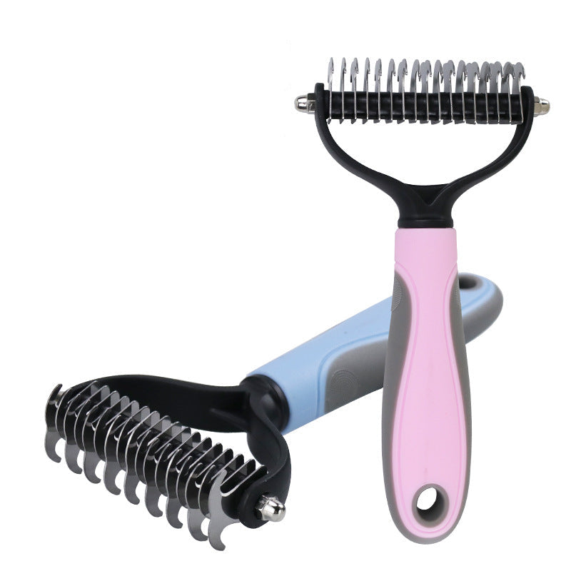 Pet grooming tool with black and pink handles on a white background